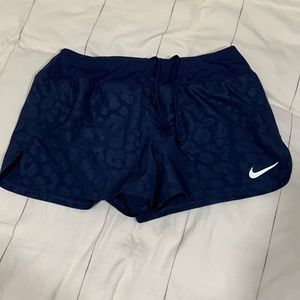 Navy Nike cheetah shorts, super cute, never worn, size Medium